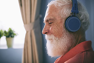 senior-man-with-headphones